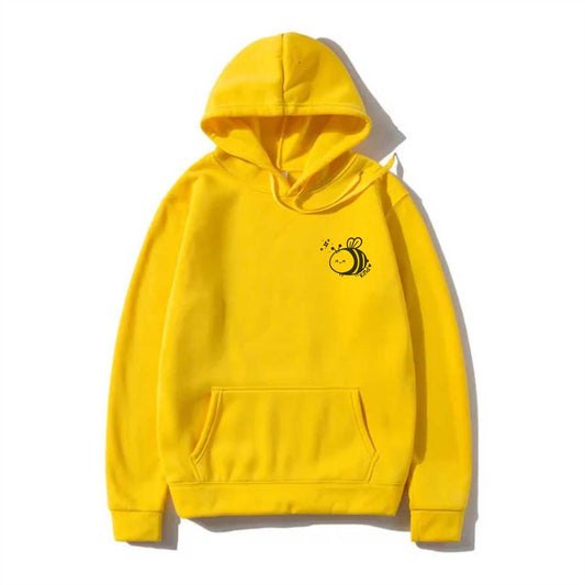 Bee Kind Yellow Hoodie featuring a cheerful bee motif and the word 'Kind' printed on the front of the hoodie.